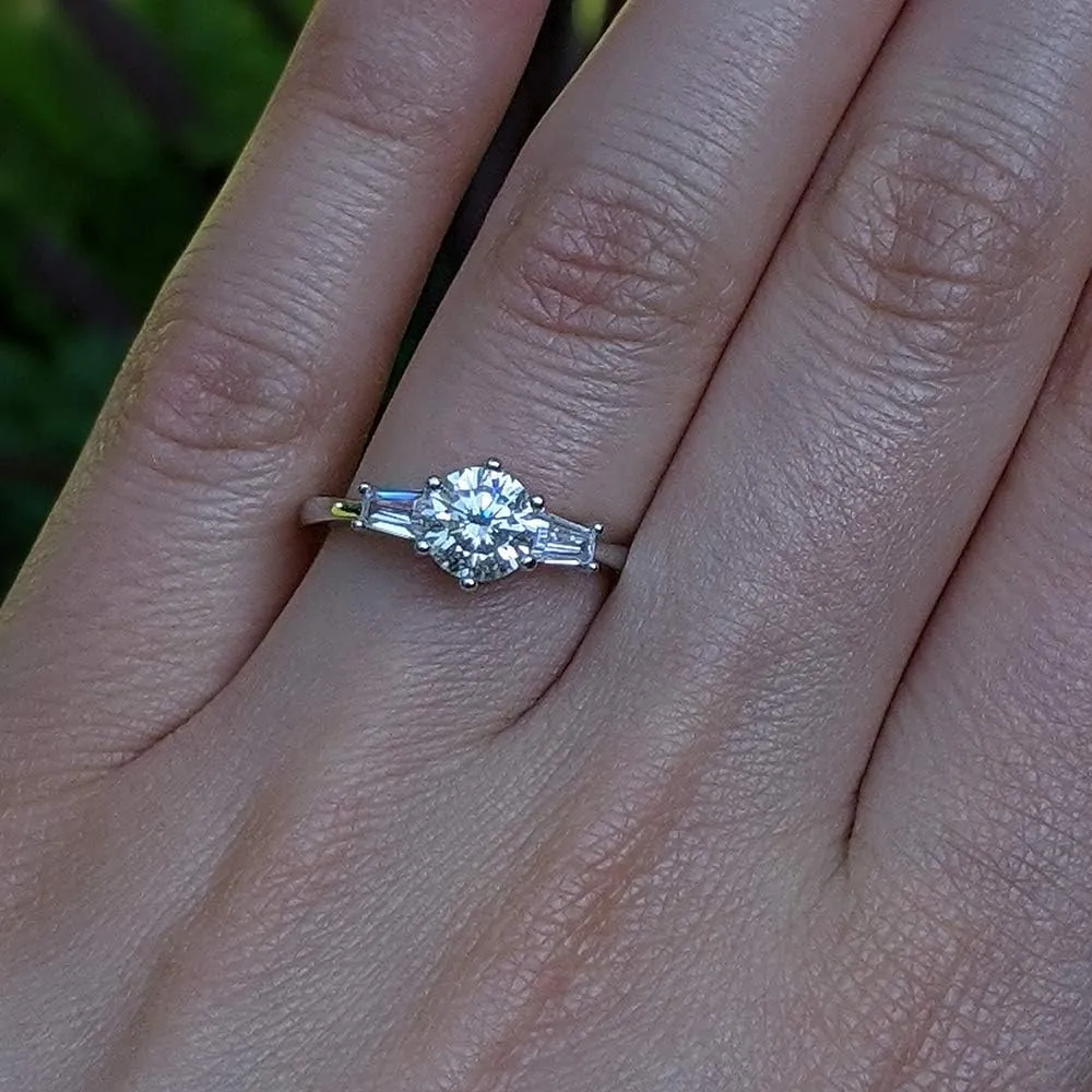 TwoBirch Platinum Plated 925 Sterling Silver 1 CT Round Moissanite Engagement Ring with Cubic Zirconia Baguette Side Stones (Sizes 5 to 9)